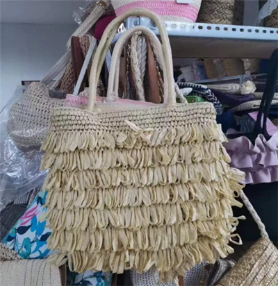 হ্যান্ড ওয়োভেন ট্যাসেল বিজ স্ট্র ব্যাগ